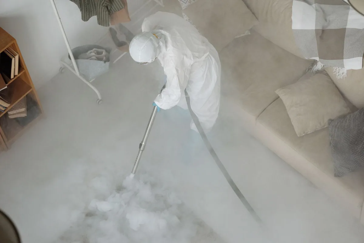 Biohazard cleanup technician in protective equipment, Clearlake Riviera, CA